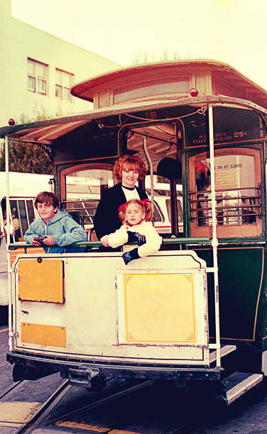 madre e figli su un filobus - transportation bus mode of transport public transportation foto e immagini stock