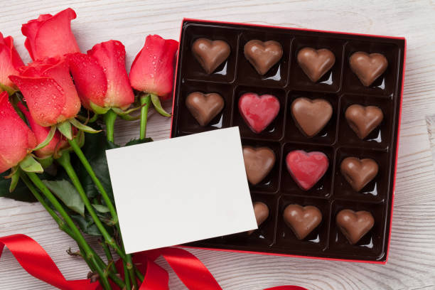 istock Valentines day with red roses and chocolate 1069952408