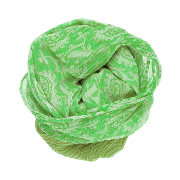 istock Green silk scarf isolated on white background. 1069952704