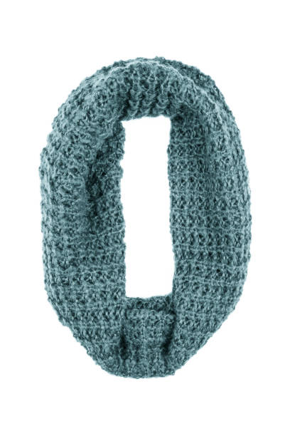 istock Green wool scarf isolated on white background. 1069953056