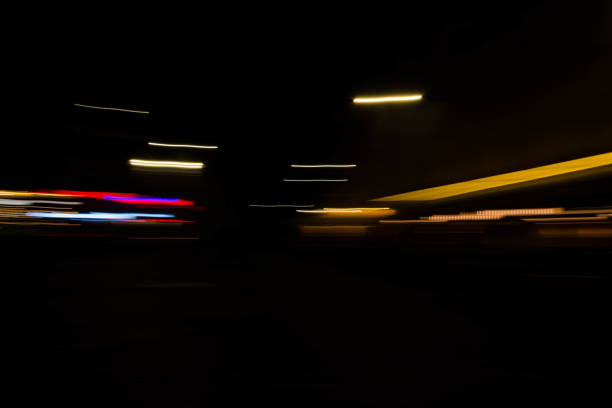 istock Slurred and stretched street lights in Paris at night 1069956304
