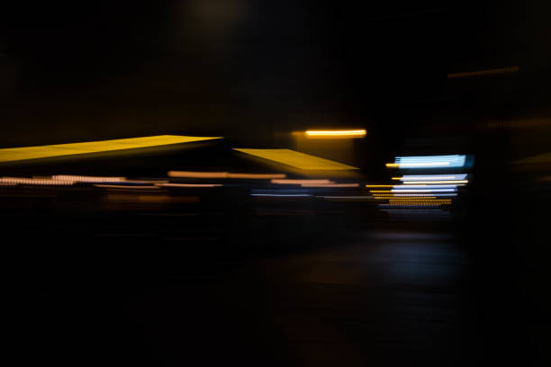istock Slurred and stretched street lights in Paris at night 1069956310