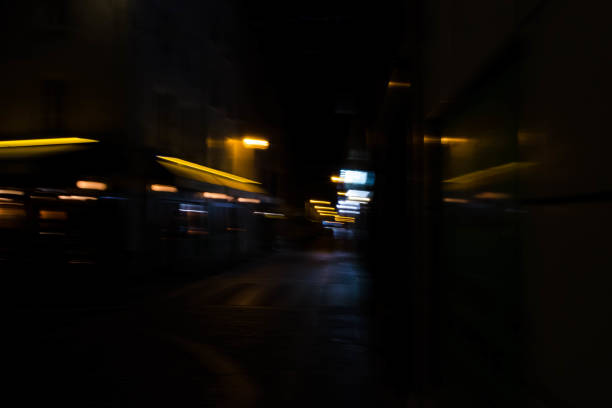 istock Slurred and stretched street lights in Paris at night 1069956320