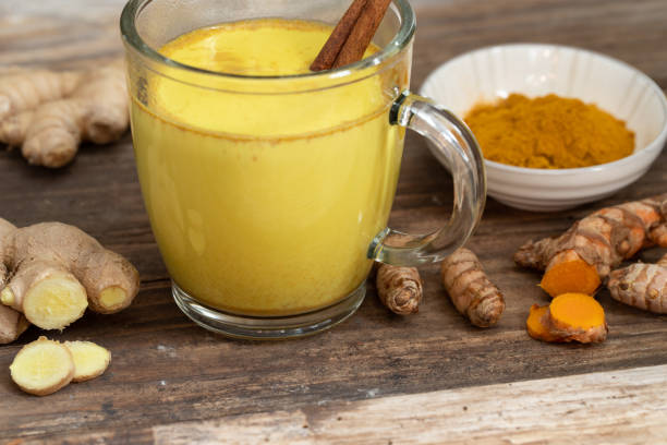 istock Golden milk with fresh ginger and turmeric 1069956530