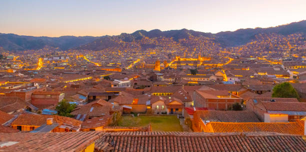 Rooftops of Cusco city in Peru, seen during the evening.