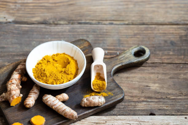 istock Fresh turmeric and dried turmeric 1069958464