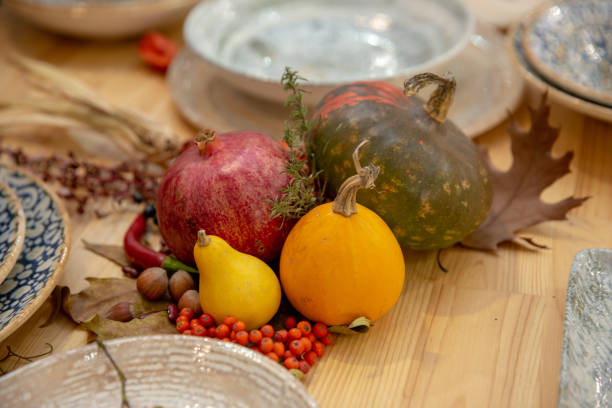 istock Pumpkins and Garnet still life. decoration for restaurant 1069971474