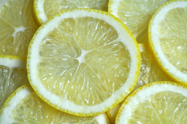 istock citrus tropical fruit - yellow lemon, sliced 1069973972