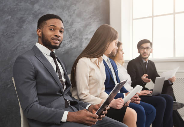 multiracial people waiting in queue preparing for job interview - challenge outline choice business imagens e fotografias de stock