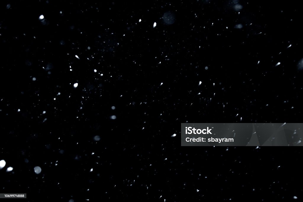 Snow texture on black background for overlay Snow Stock Photo