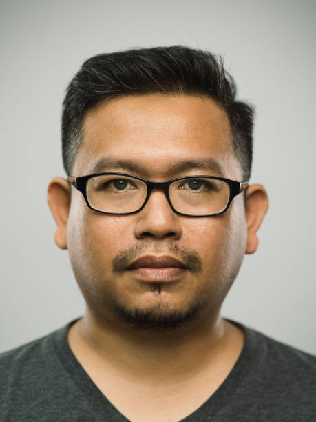 реальный малайзийский взрослый человек с пустым выражением - portrait human face men overweight стоковые фото и изображения