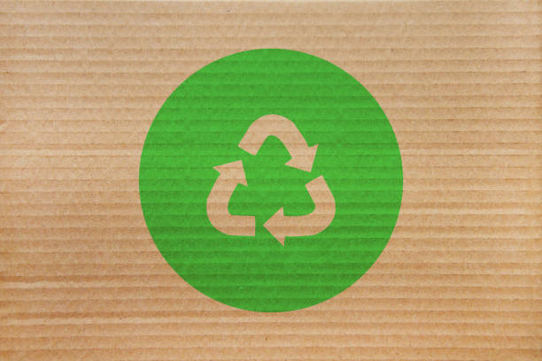 symbol for refuse reuse recycle with cardboard background