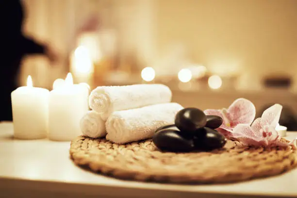 Still life shot of various spa essentials on a table