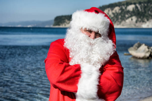istock Santa Claus is resting on the sea. 1069989048