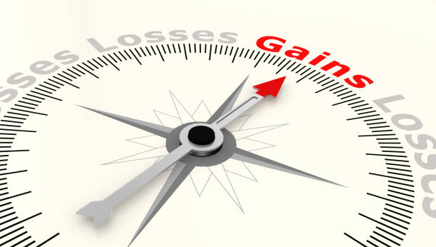 istock Compass with arrow pointing to the word gains 1069989414