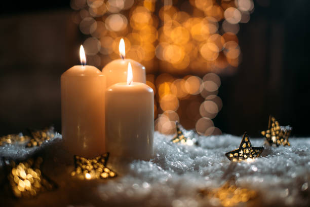 istock Christmas Sparkle Candles Decoration with Christmas light 1069989734