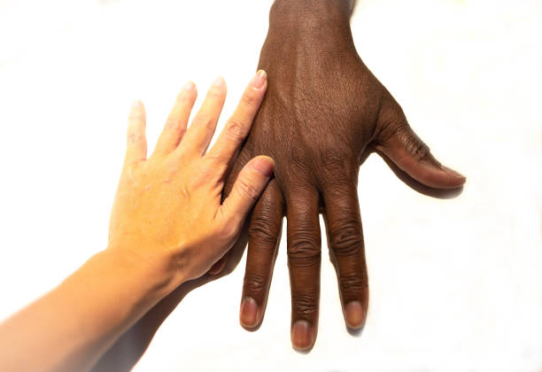Hands in hands photos: Main concept is contrast. Difference of color is beautiful. I didn't edit texuture on skin because i believe that wrinkled fingers tell you story or give you something to imagine, it might be his age or occupation or season,,, TV remote in hand also tells you that he fell in sleep while watching TV, he might have been watching American foorball or National Geography or Mission Impossible.