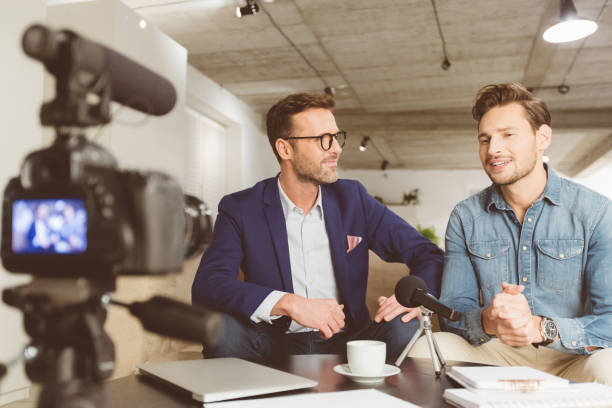 istock Video bloggers recording content on camera 1069993436