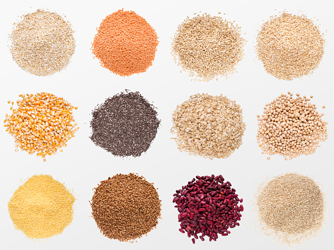 Collection of various grains and cereals, isolated on white background, top view