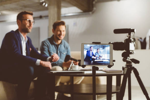istock Business men making a vblog 1069993806