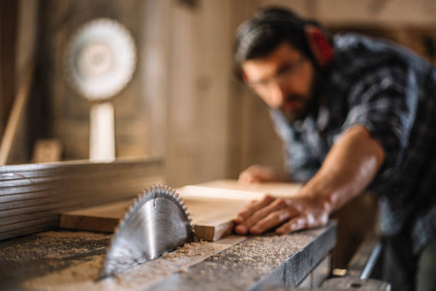 istock Carpenter cutting wooden plank 1070000600