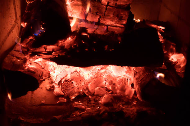 istock Hot coals burning out in the fireplace closeup 1070003214