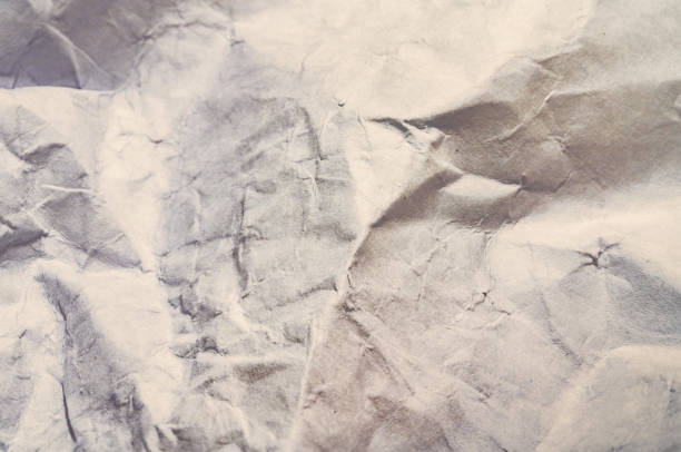 close up of crumpled white paper.