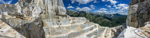 Photo of High stone mountain and marble quarries in the Apennines in Tuscany