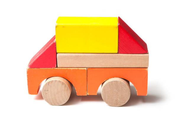 istock bus on colorful wooden blocks on white background 1070015446