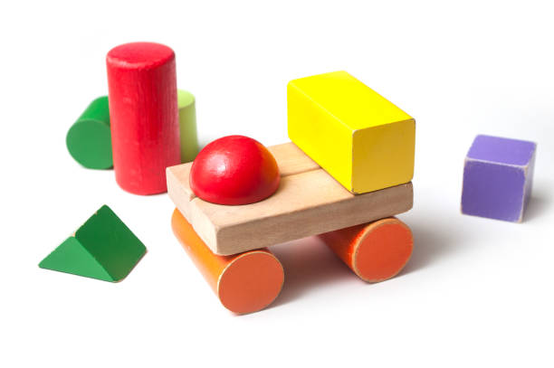 istock vehicle on colorful wooden blocks on white background 1070018576