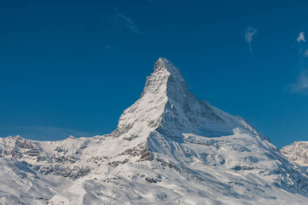 Majestic Matterhorn mountain in front of a blue sky in Zermatt ski area, Switzerland