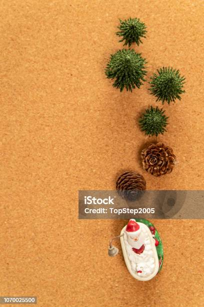 Green Christmas Tree With Pine Cone And Santa In Bathtub Stock Photo - Download Image Now