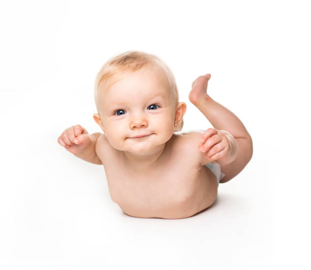 istock Cute baby with beautiful blue eyes on the white flooor 1070026196