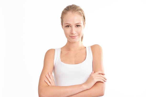 istock Young woman with beautiful face standing at isolated background 1070029166