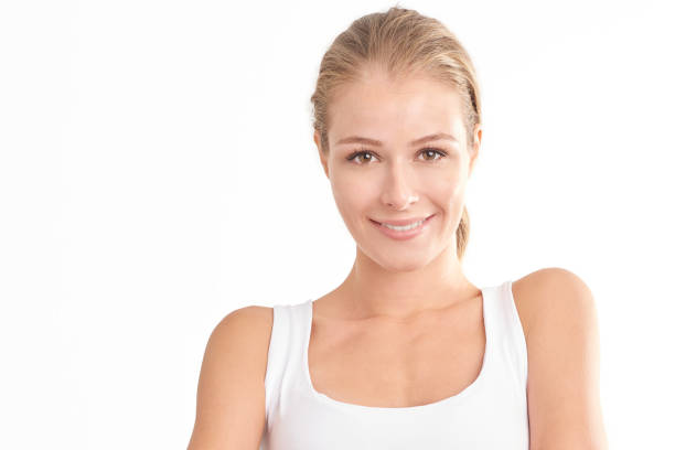 istock Smiling young woman portrait with beautiful face 1070029204