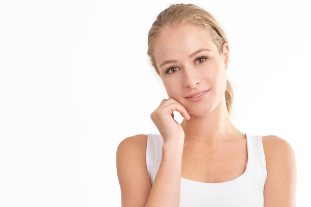 istock Smiling young woman portrait with beautiful face 1070029268