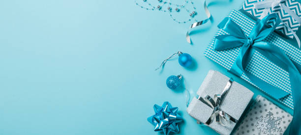 istock Christmas background - presents and decorations in silver and blue 1070041016