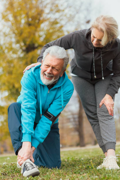 istock Elderly man ankle sprain pain while running 1070043226