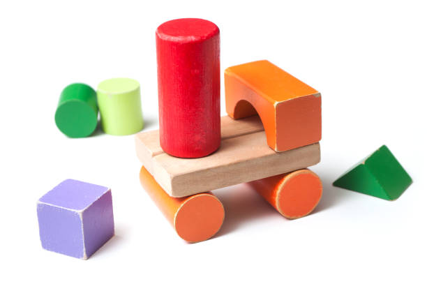 istock vehicle on colorful wooden blocks on white background 1070046072