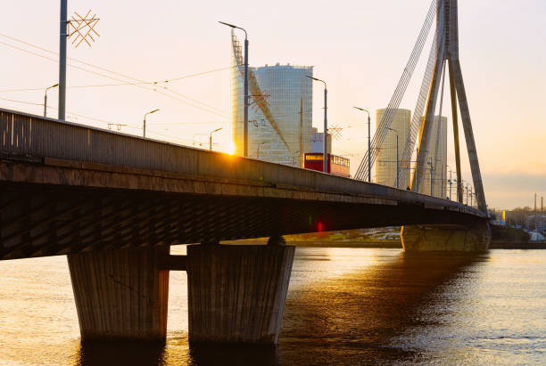 istock Modern business skyscrapers and Vansu Bridge above Daugava River Riga 1070047786
