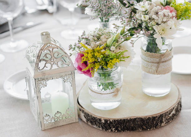 istock flowers arrangement and decoration rustic interior design in wedding table detail 1070056466