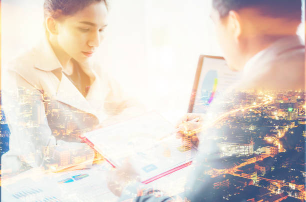 istock Digital Composite Image Of Business People And Cityscape 1070057052