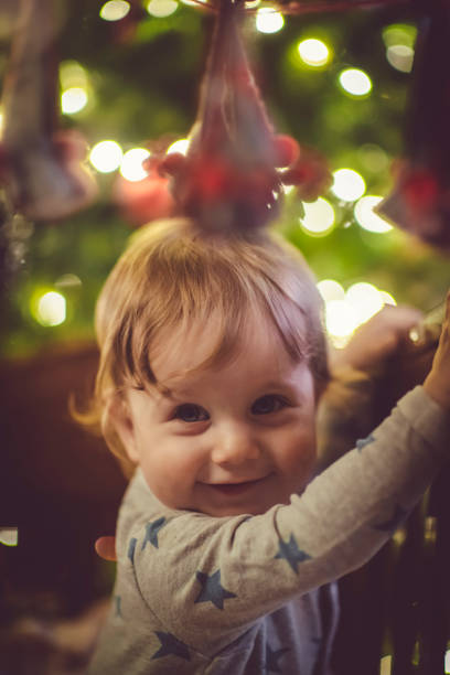istock Cute boy in crib in Christmas 1070057146