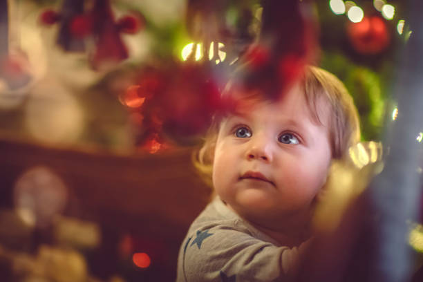 istock Cute boy in crib in Christmas 1070057290