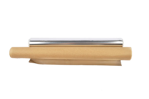 istock Baking paper and aluminum foil on white background 1070061448