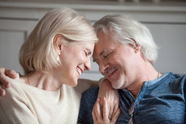 istock Happy sensual aged couple touching enjoying romantic moment 1070069338