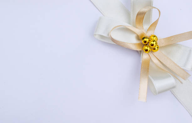 istock Gift ribbon with bow isolated on white 1070070554