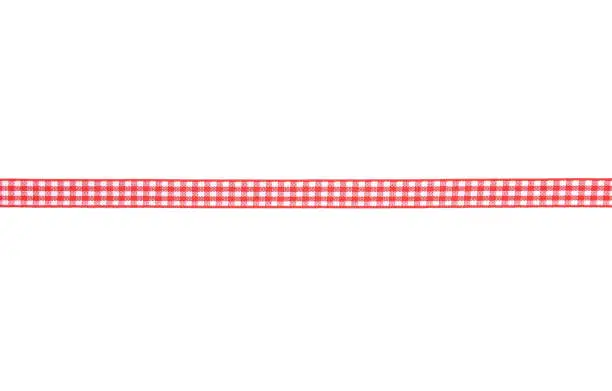 Red-white checked ribbon on white
