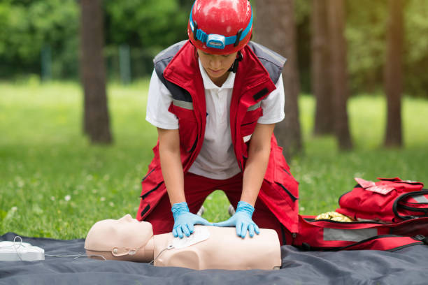 istock Healthcare Worker Practicing On Cpr Dummy At Park 1070074058