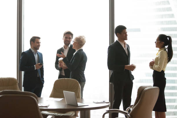 istock Colleagues having casual talk during work break in office 1070079964